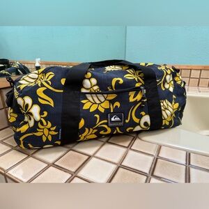 Vintage Quiksilver Navy and Yellow Floral Duffel Bag